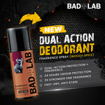 A bottle of BAD LAB dual action deodorant fragrance spray in Woody Spice scent, shown on a dark textured background with promotional text and a koala illustration on the label.