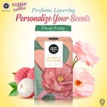 Good Virtues Co. Lychee & May Rose Eau De Toilette perfume surrounded by fresh roses and lychee fruits for a floral fragrance vibe.