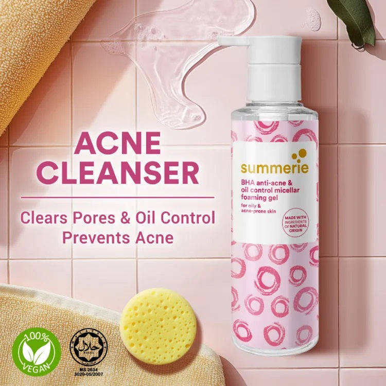 Acne cleanser bottle with pink and white design on a pink background