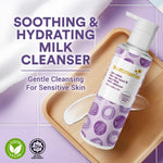 Summier soothing and hydrating milk cleanser bottle on a wooden tray with a purple background