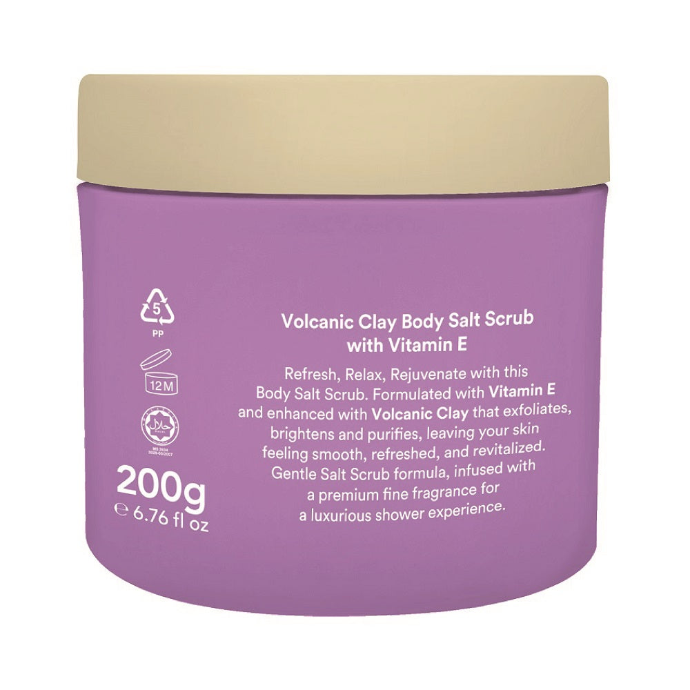 Purple jar of volcanic clay body salt scrub with beige lid on a white background